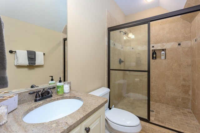 1051 Swift Crk, Greensboro, GA 30642 - bathroom featuring toilet, a stall shower, and vanity
