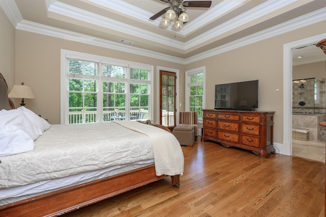 1051 Swift Crk, Greensboro, GA 30642 - bedroom featuring wood finished floors, access to outside, ornamental molding, a tray ceiling, and ensuite bath