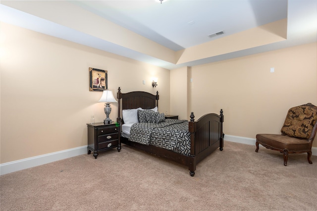 1051 Swift Crk, Greensboro, GA 30642 - bedroom with light carpet, baseboards, and a tray ceiling