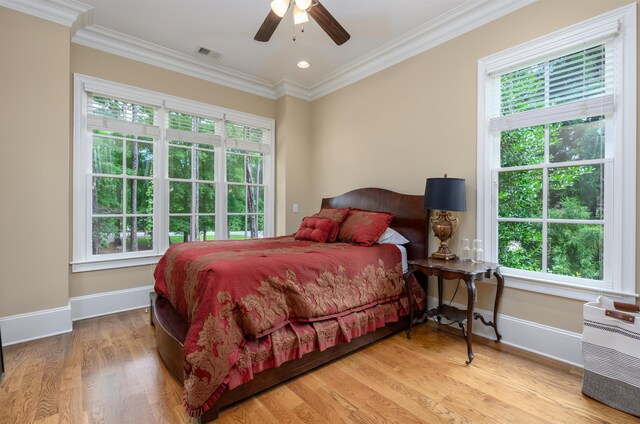 1051 Swift Crk, Greensboro, GA 30642 - bedroom with ornamental molding, baseboards, wood finished floors, and ceiling fan