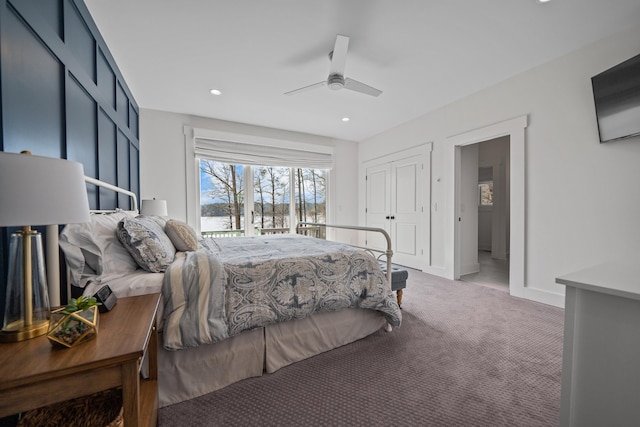 carpeted bedroom featuring a ceiling fan, recessed lighting, a closet, and baseboards