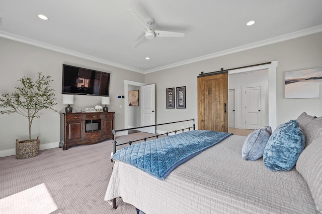 bedroom with a barn door, recessed lighting, light colored carpet, baseboards, and ornamental molding