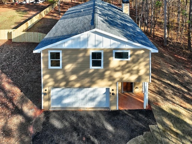 view of home's exterior featuring a garage