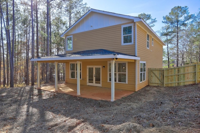 back of property featuring a patio and french doors