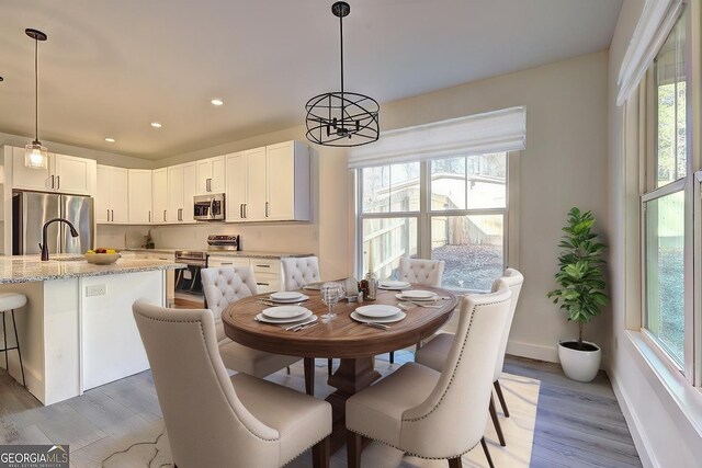 rear view of property featuring french doors and a patio area