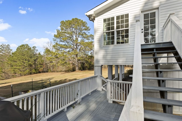 wooden terrace with stairway and grilling area