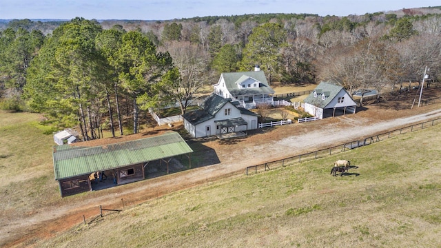 bird's eye view with a rural view and a forest view