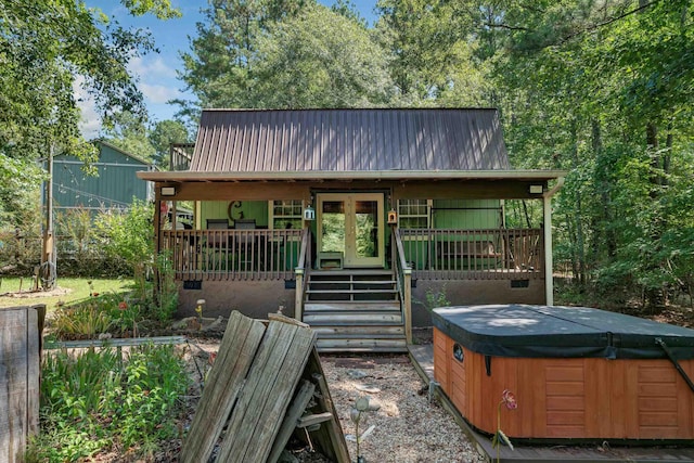 160 Rockville Springs Dr, Eatonton, GA 31024 - chalet / cabin with a hot tub and metal roof