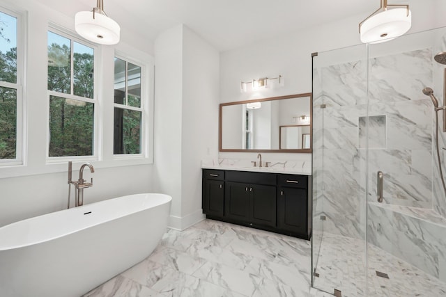 full bath featuring marble finish floor, a marble finish shower, baseboards, a freestanding bath, and vanity