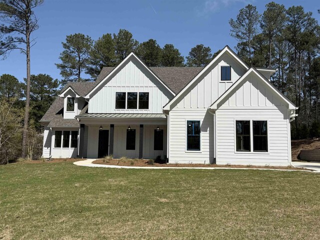 modern farmhouse style home with covered porch