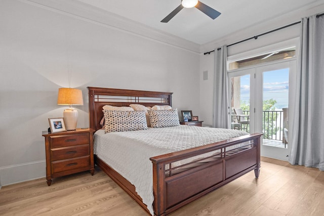 bedroom featuring access to outside, ornamental molding, ceiling fan, and light wood-type flooring