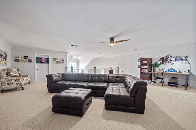 living room with ceiling fan and light carpet