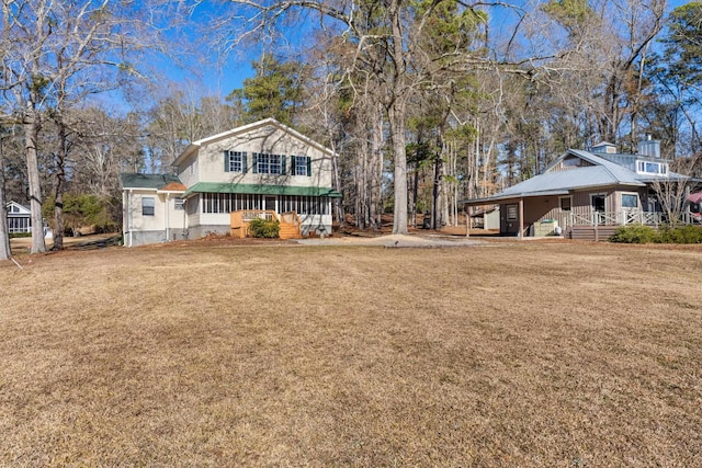 view of yard featuring covered porch