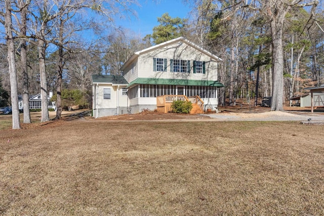 exterior space featuring a front yard and covered porch