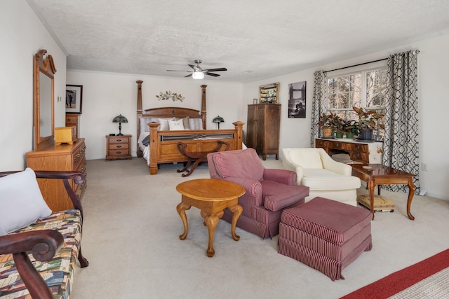 bedroom featuring light carpet, ceiling fan, and a textured ceiling