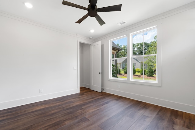 unfurnished room with ceiling fan and dark hardwood / wood-style flooring