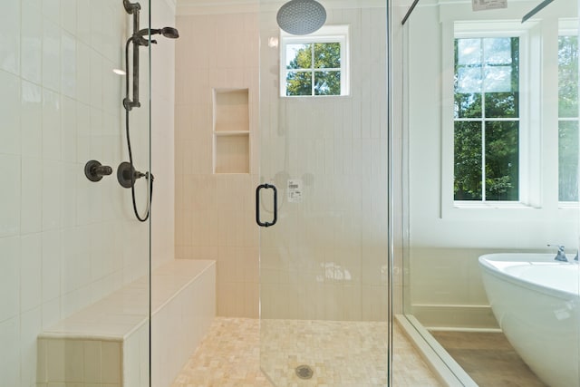 bathroom with independent shower and bath