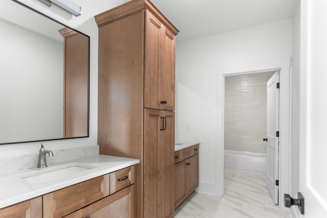 2050 Osprey Poynte, Greensboro, GA 30642 - full bathroom with vanity, marble look tile flooring, and a bathtub