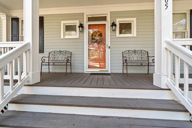 doorway to property with a porch