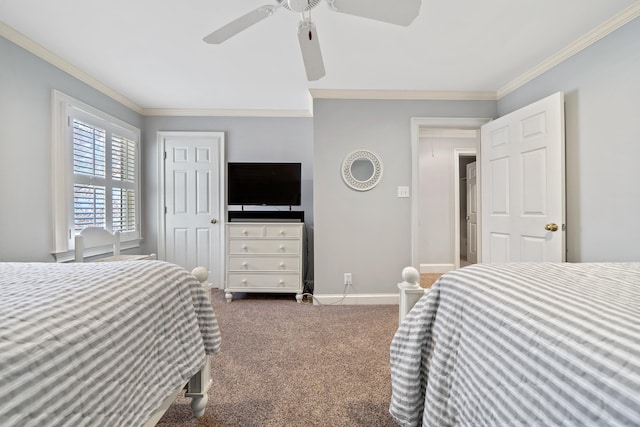 carpeted bedroom featuring ceiling fan, baseboards, and ornamental molding