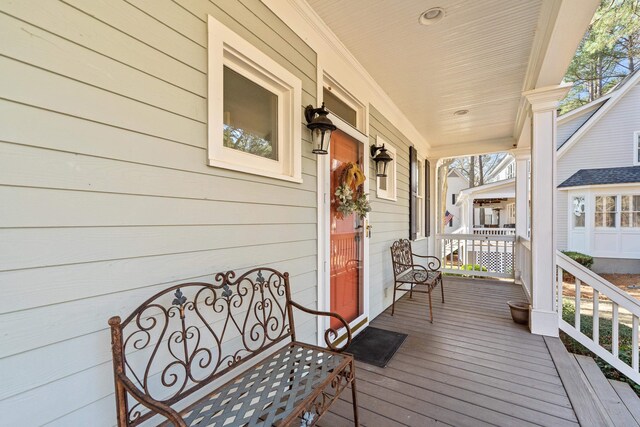 deck with covered porch