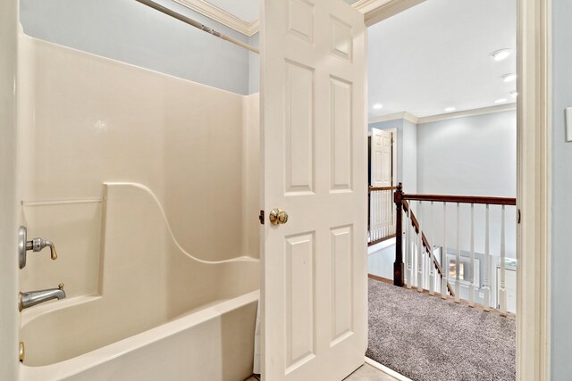 full bathroom featuring shower / bathing tub combination, recessed lighting, and ornamental molding