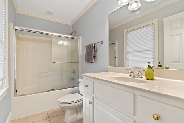 bathroom with vanity, enclosed tub / shower combo, ornamental molding, tile patterned floors, and toilet