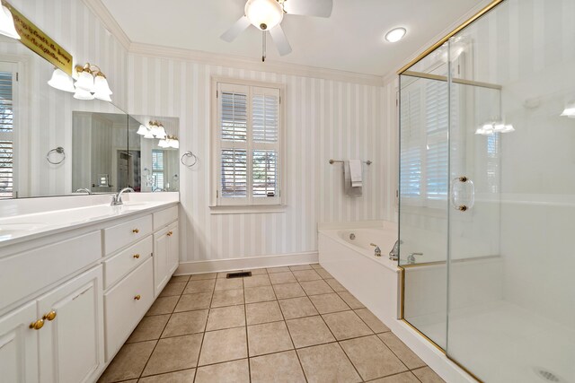 full bath featuring wallpapered walls, a stall shower, ornamental molding, a sink, and tile patterned floors