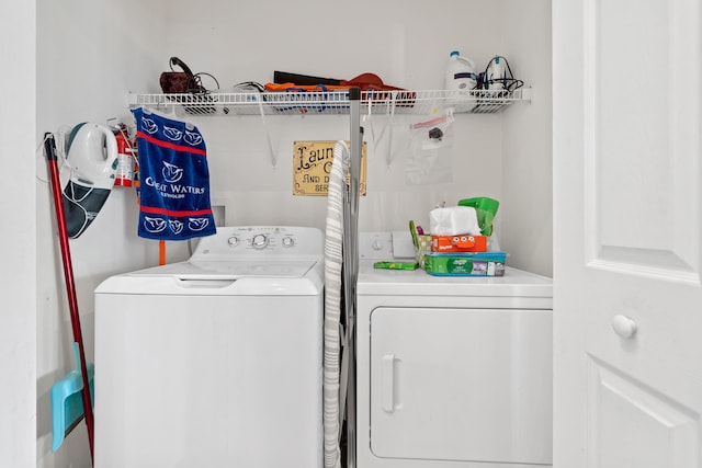 laundry area with washer and dryer and laundry area