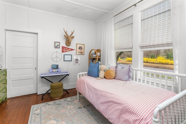 bedroom featuring wood finished floors