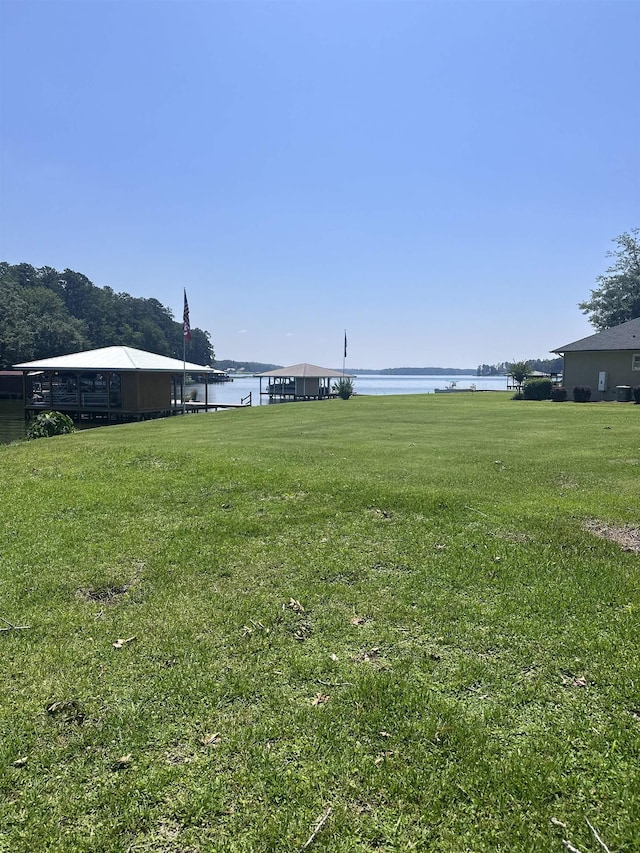 view of yard with a water view