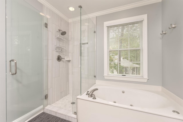 bathroom with crown molding and separate shower and tub