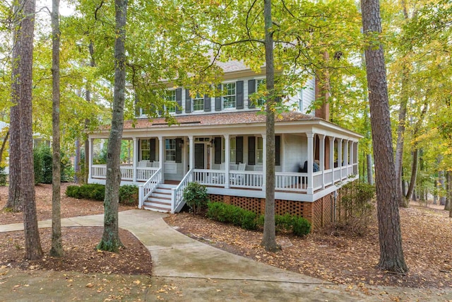 colonial-style house with covered porch