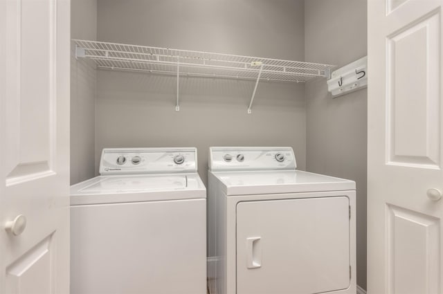 laundry area with washer and clothes dryer