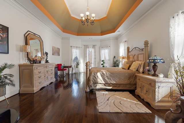 bedroom with visible vents, ornamental molding, dark wood-type flooring, a raised ceiling, and a notable chandelier