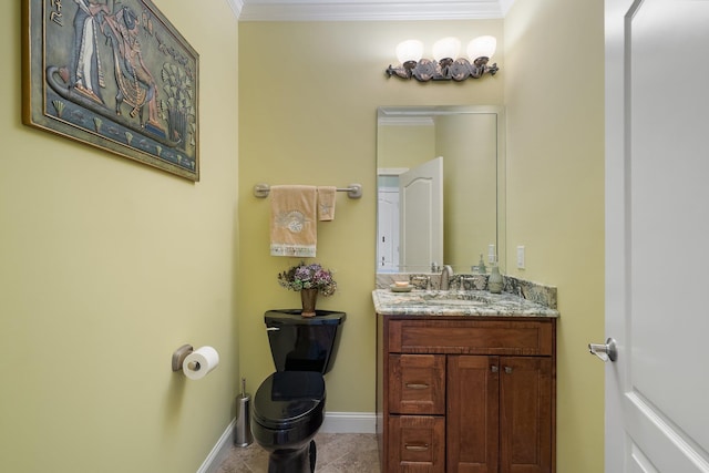 half bathroom with vanity, baseboards, ornamental molding, tile patterned flooring, and toilet