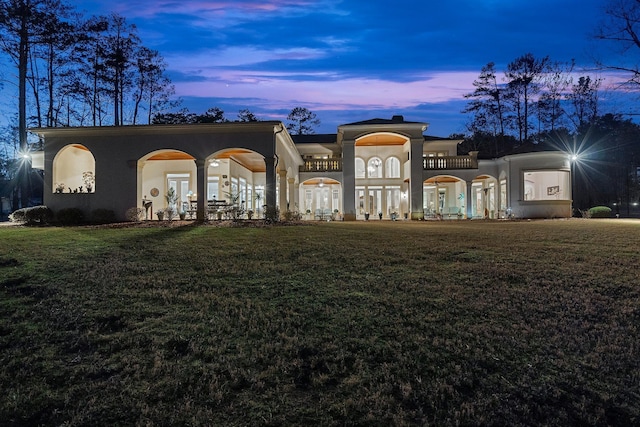 view of property's community with a lawn