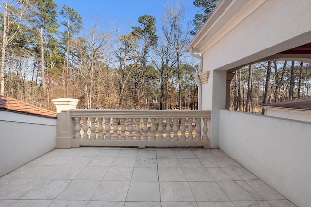 view of patio with a balcony