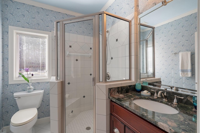 bathroom featuring toilet, wallpapered walls, and crown molding