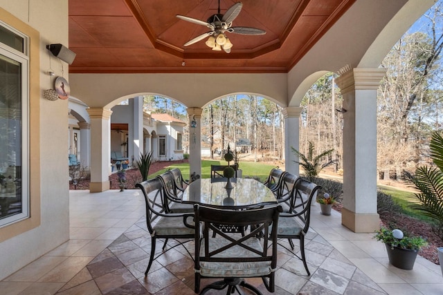 view of patio / terrace featuring outdoor dining area and ceiling fan