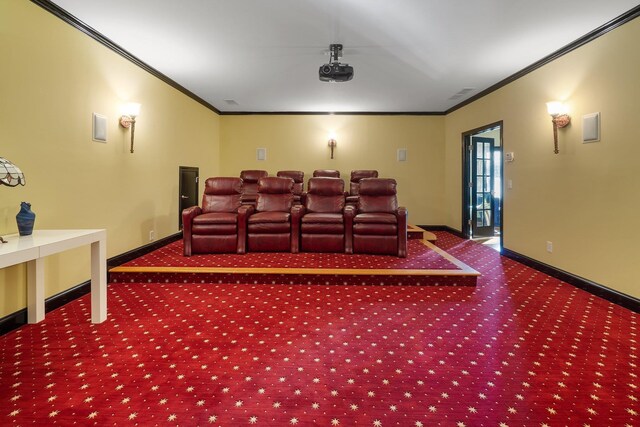 home theater room with baseboards, carpet, and ornamental molding