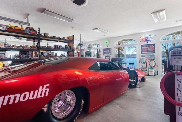 garage with visible vents and a garage door opener