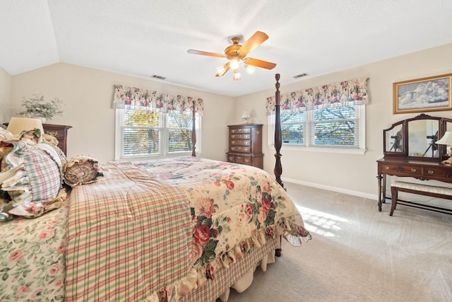 bedroom featuring multiple windows, light carpet, and visible vents