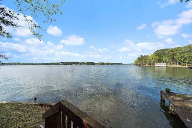 view of dock with a water view