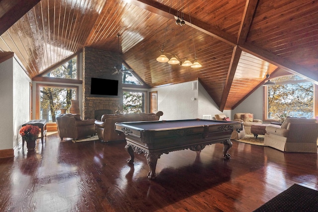 game room with pool table, a stone fireplace, wood ceiling, and wood finished floors