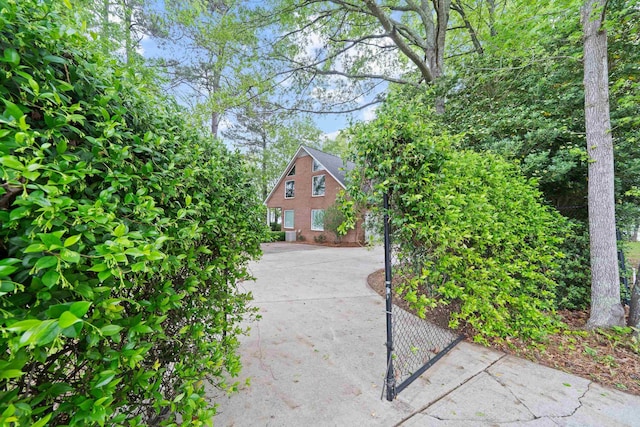 exterior space featuring concrete driveway