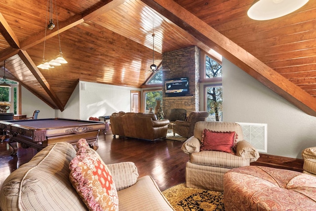game room featuring visible vents, plenty of natural light, wood finished floors, and vaulted ceiling with beams