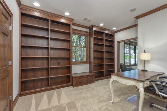 office space with light carpet and ornamental molding