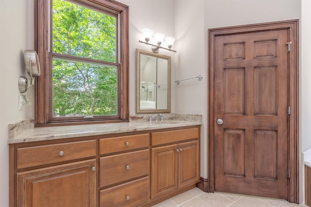 bathroom featuring vanity and tile patterned flooring