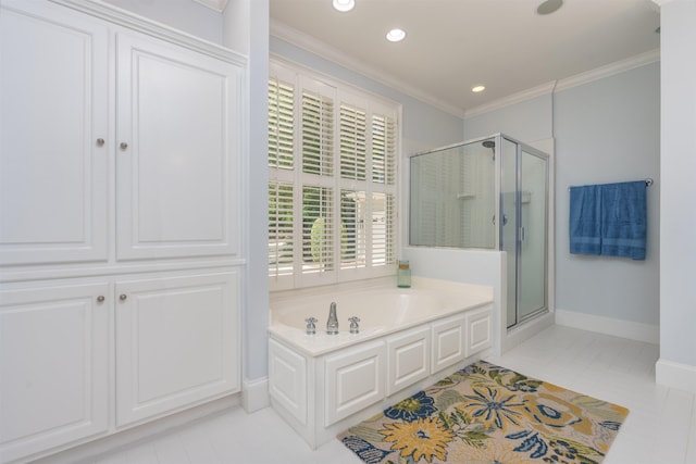 bathroom with tile patterned flooring, plus walk in shower, and crown molding